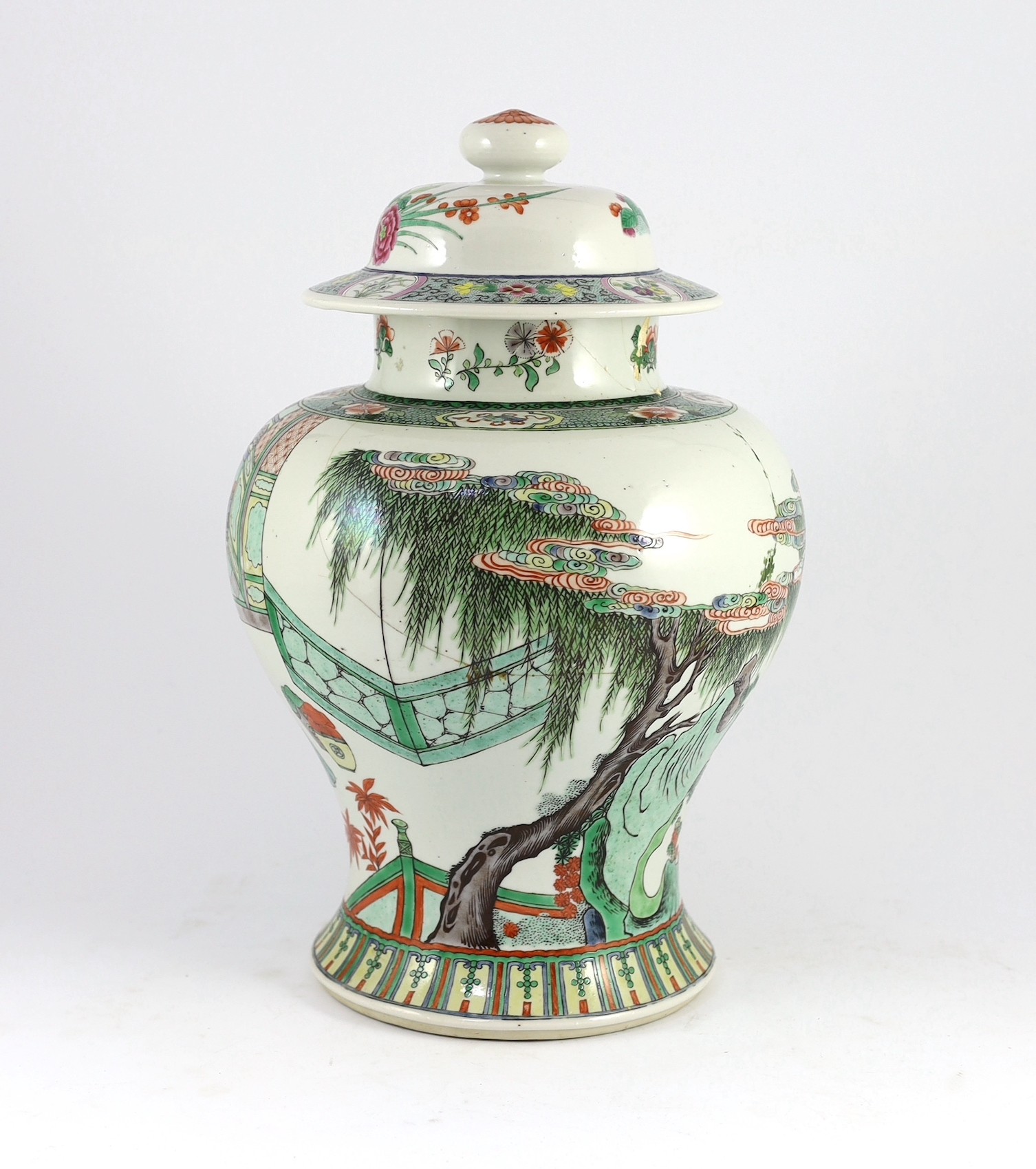 A Chinese famille verte jar and associated cover, 19th century, 41cm high, damaged and matched cover